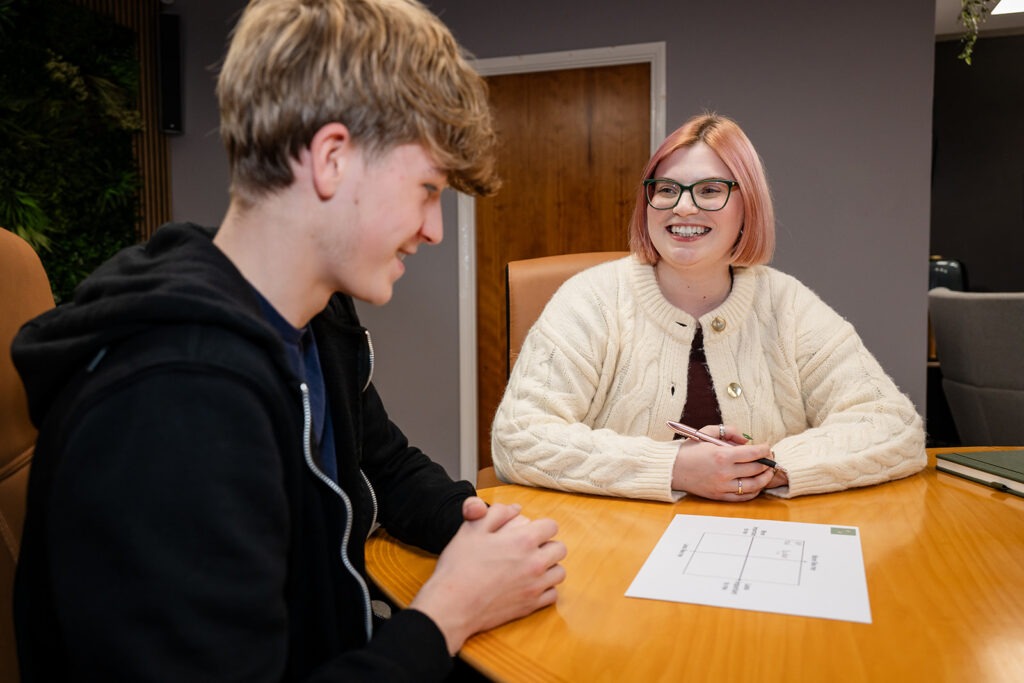 Charlotte working with a teenager